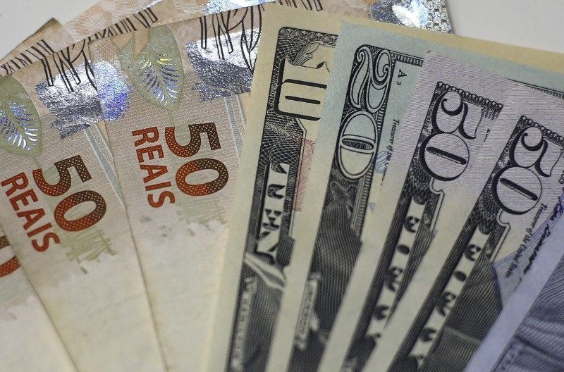 Dólar abre próximo da estabilidade com novos dados de inflação nos EUA em foco